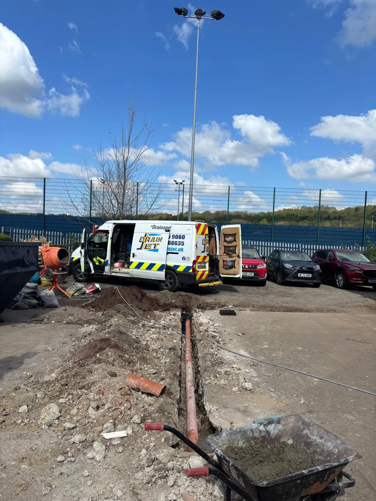 Professional drain installation and trenching work being performed by Drain Jet at a commercial premises in Leeds.