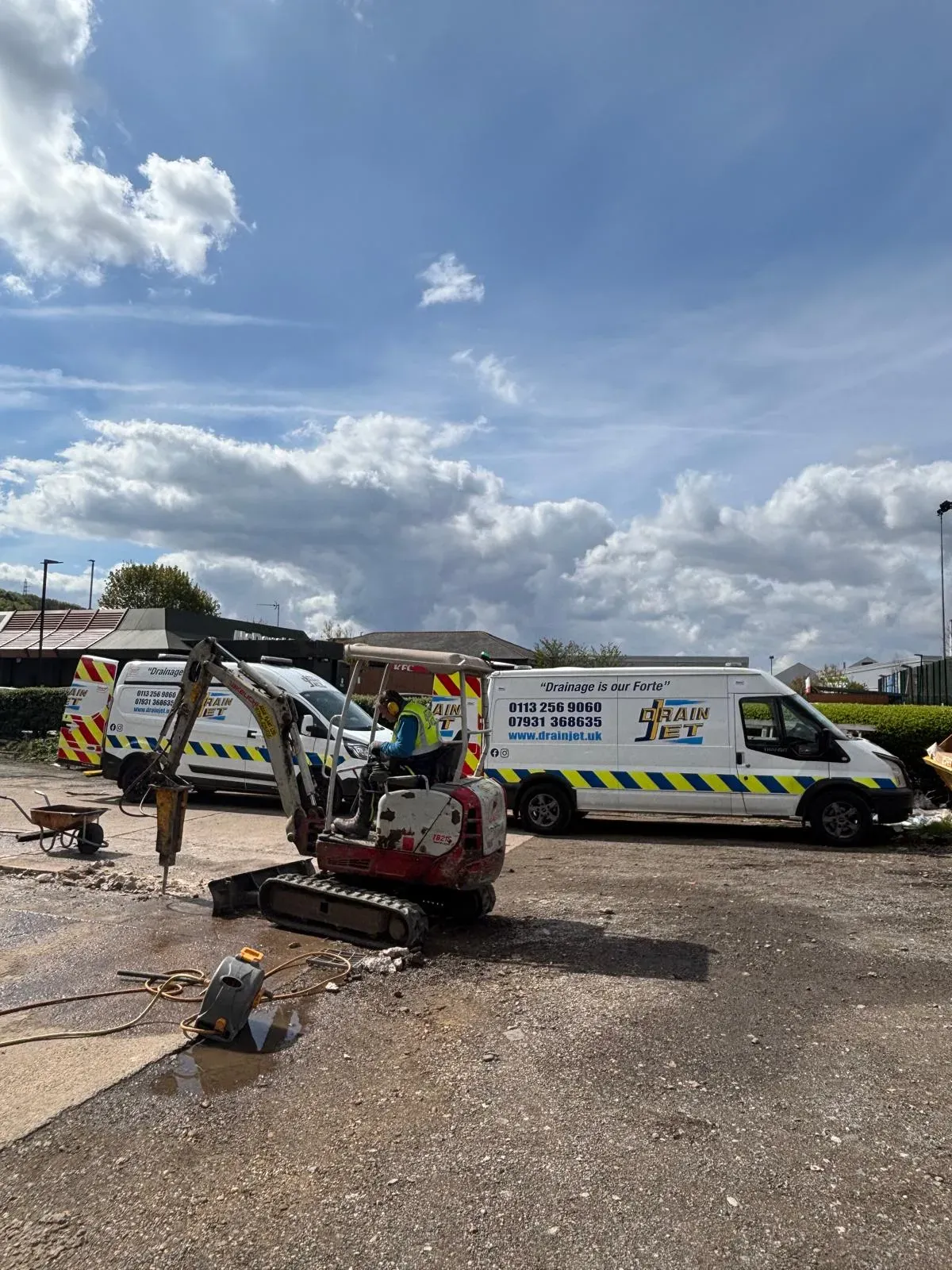 Professional drain repairs and installations in Leeds using a mini digger and breaker.